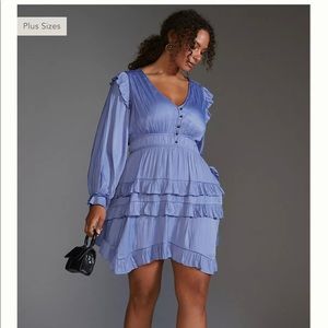 Only worn once! Like new! beautiful long sleeve ruffled mini dress